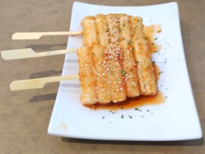 Fried rice sticks on skewers